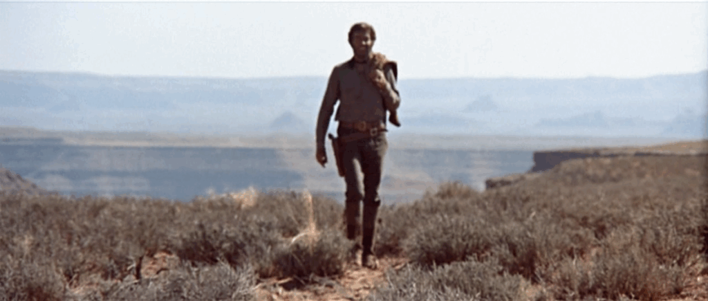 Henry Fonda as Frank in Once Upon a Time in the West walking through the desert