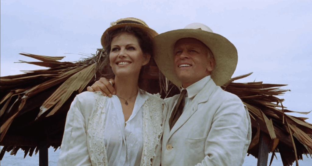 Claudia Cardinale and Klaus Kinski in Fitzcarraldo, looking triumphantly out at the ship being rebuilt